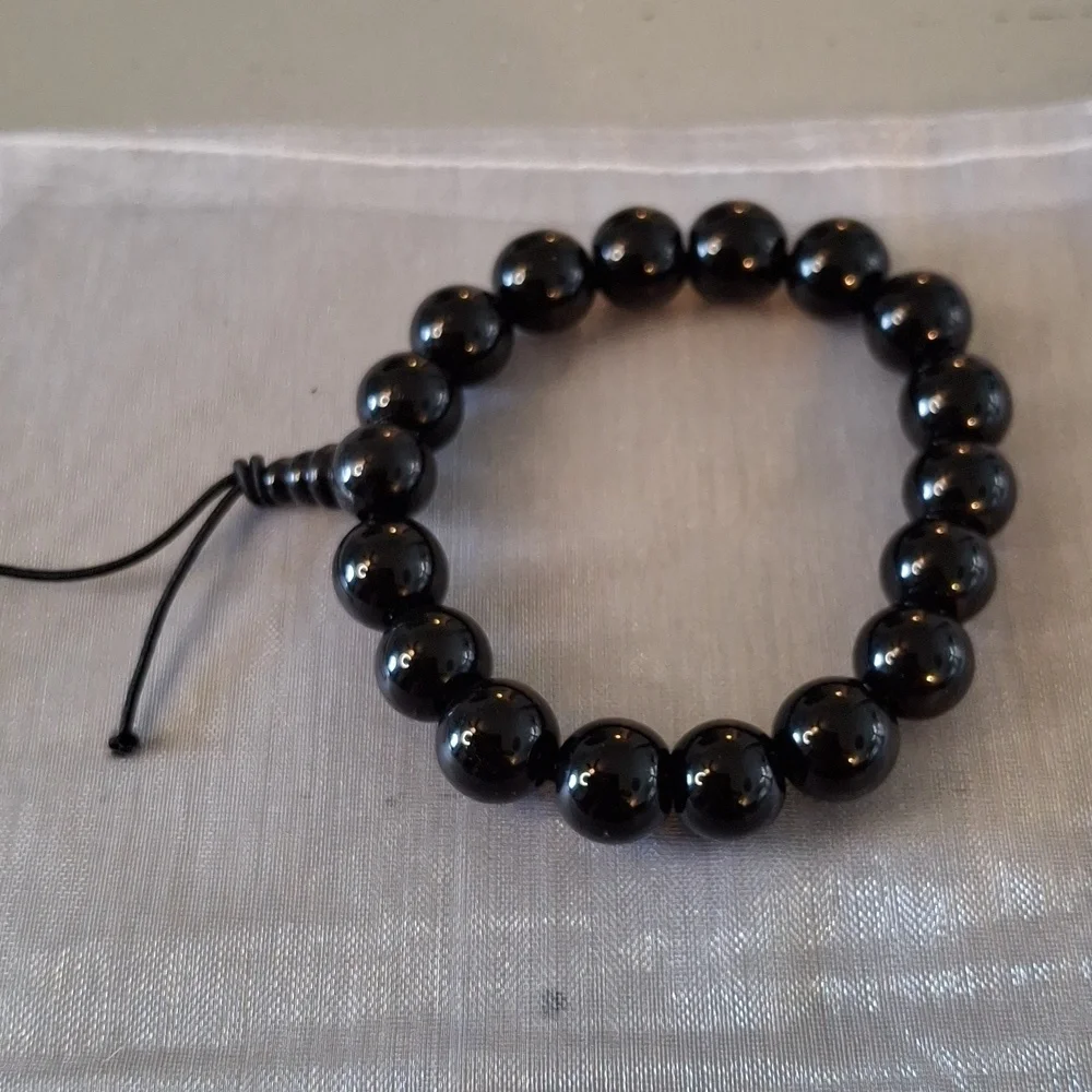 Set of Three Beaded Bracelets in Black, White, and Turquoise - Picture 5 of 6